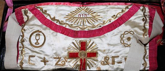 A Masonic apron, in tin case